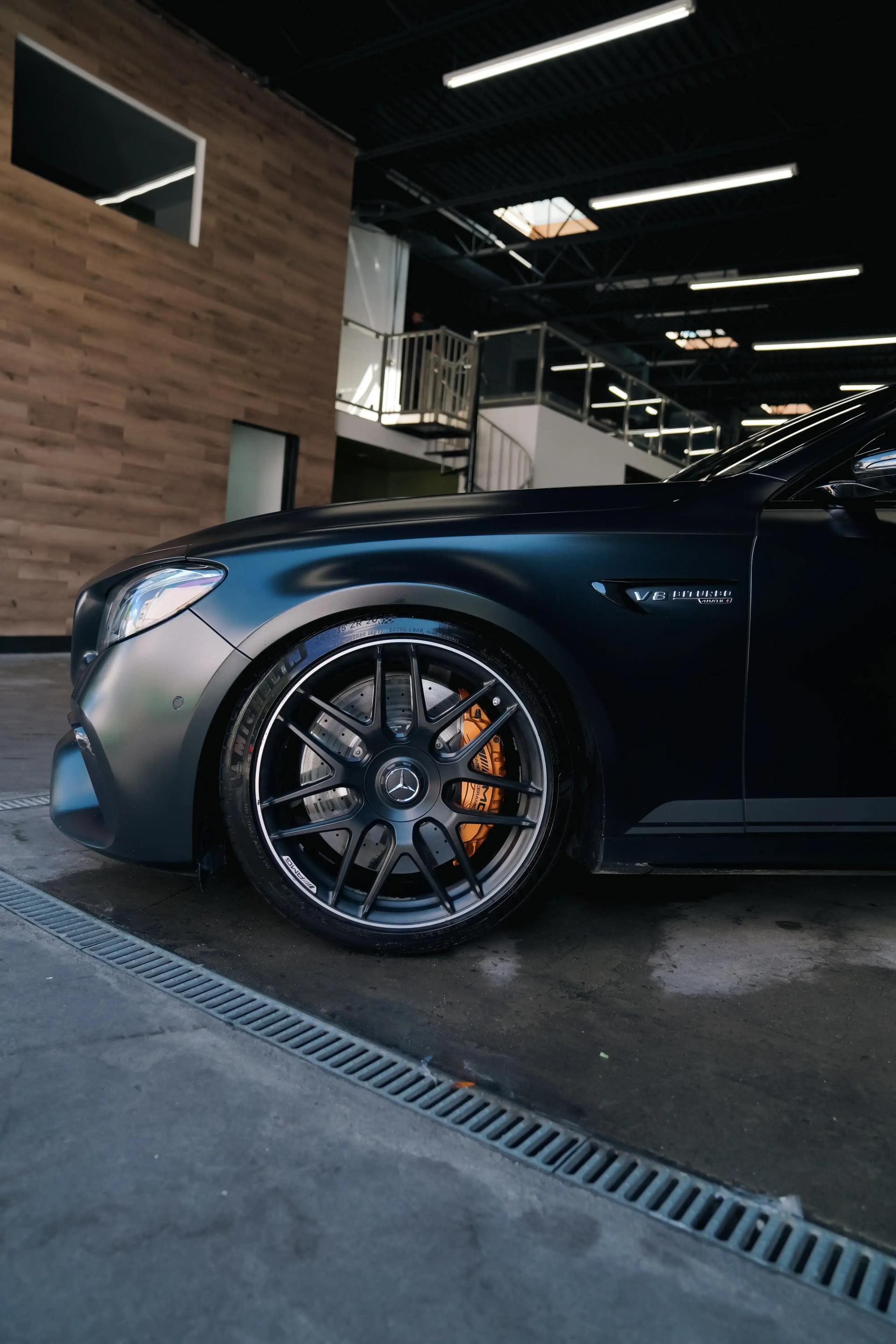 Custom vinyl wrap application on Mercedes AMG - Premium color change and paint protection wrap installation